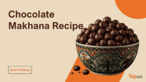 Chocolate makhana in a bowl, fox nuts coated in dark cocoa sauce with a cocoa powder dusting