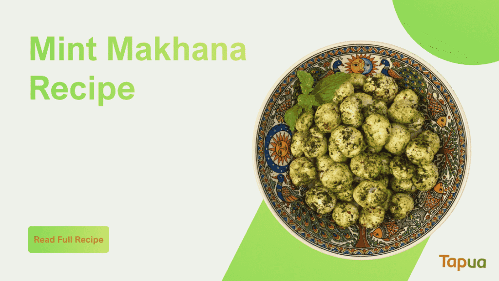 Mint makhana in a white bowl with fresh mint leaves on top, green-dusted and crispy