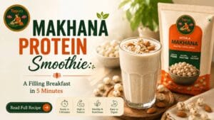 Glass of makhana protein smoothie topped with chia seeds and apple slices